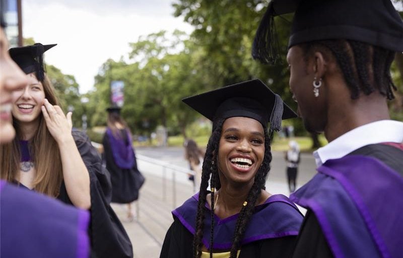 Some graduates smiling