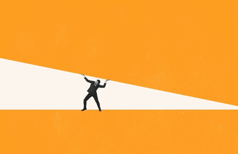 Contemporary art collage. Businessman standing under heavy pressure concept