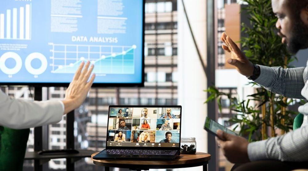 Colleagues collaborating over video call with colleagues